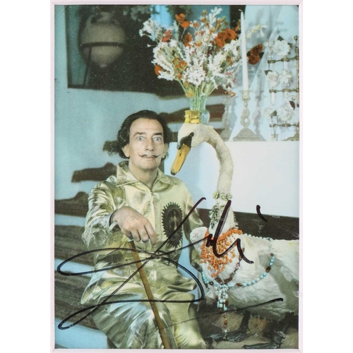 96 - A Salvador Dali signed menu and photo, mounted with two additional images of Salvador Dali (one indi... 