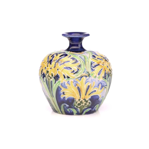 118 - William Moorcroft for James MacIntyre, a Florian 'Cornflower' vase, circa 1902, in yellow, blues and... 