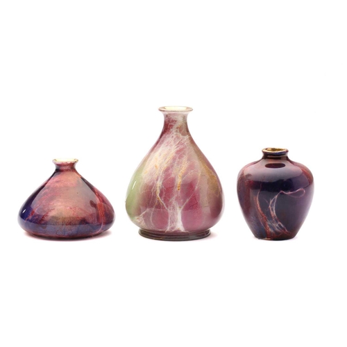 53 - Three Wilkinsons ‘Oriflame’ miniature vases, in various mauve, green and deep purple glazes, black p... 