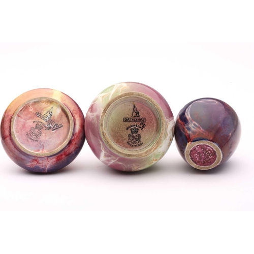 53 - Three Wilkinsons ‘Oriflame’ miniature vases, in various mauve, green and deep purple glazes, black p... 