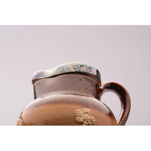 58 - Twenty Doulton stoneware miniature harvest jugs, twelve of them having silver rims, largest 4.5cm hi... 