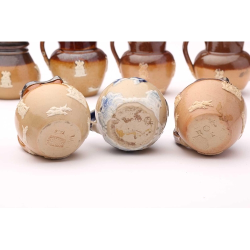 58 - Twenty Doulton stoneware miniature harvest jugs, twelve of them having silver rims, largest 4.5cm hi... 