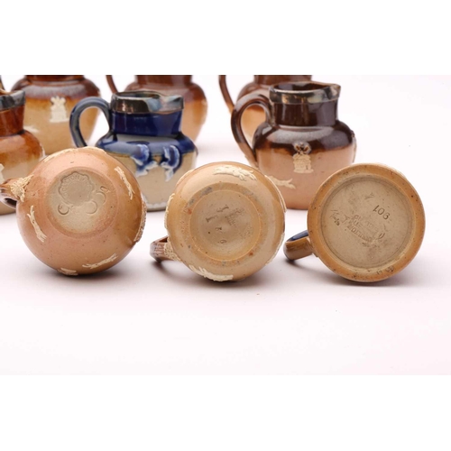 58 - Twenty Doulton stoneware miniature harvest jugs, twelve of them having silver rims, largest 4.5cm hi... 