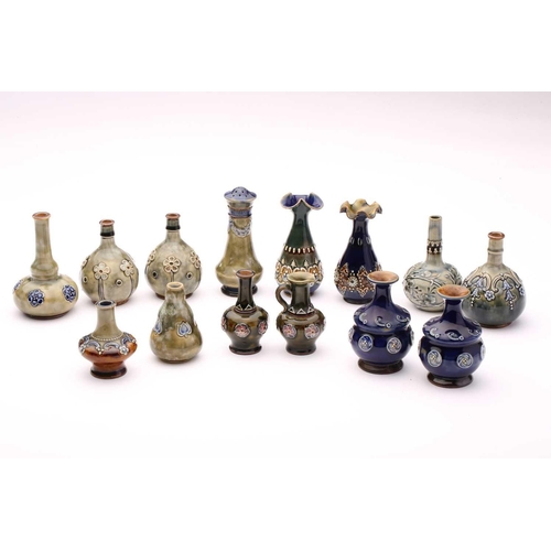 76 - A collection of fourteen Doulton stoneware miniature vases, jug and pepperette, largest 10.5cm highQ... 