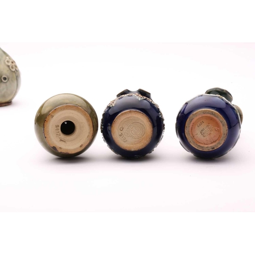 76 - A collection of fourteen Doulton stoneware miniature vases, jug and pepperette, largest 10.5cm highQ... 