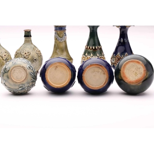 76 - A collection of fourteen Doulton stoneware miniature vases, jug and pepperette, largest 10.5cm highQ... 