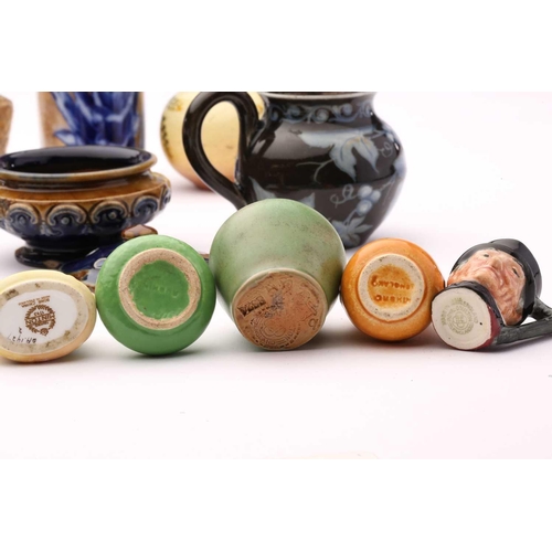 85 - A mixed lot of ceramic miniatures, including a pair of Doulton faience bulbous vases, 9cm high; pair... 