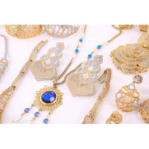 108 - A quantity of assorted costume jewellery including Indian dress sets, necklaces, earrings, bangles a... 