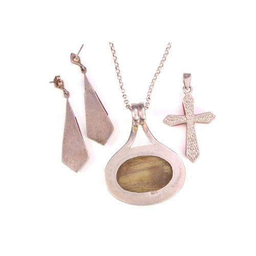 111 - A necklace, pendant and earrings. Featuring a white metal stamped '925' chain with a large oval ston... 