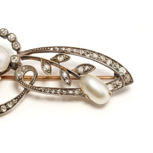 114 - An Edwardian pearl and diamond brooch, comprising an egg-shaped white pearl with silver overtones, a... 