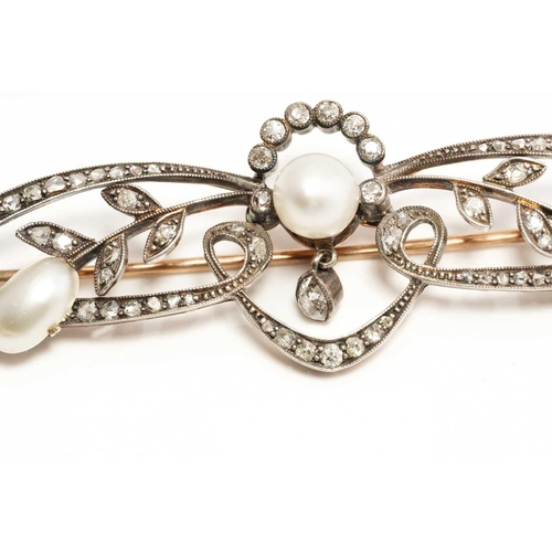 114 - An Edwardian pearl and diamond brooch, comprising an egg-shaped white pearl with silver overtones, a... 