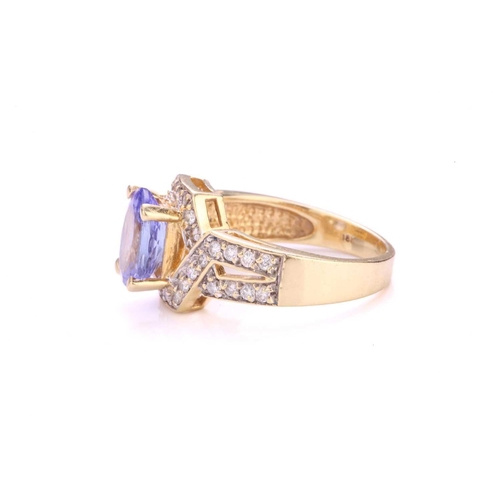 116 - A tanzanite and diamond dress ring, centrally set with oval faceted tanzanite with a light bluish-pu... 