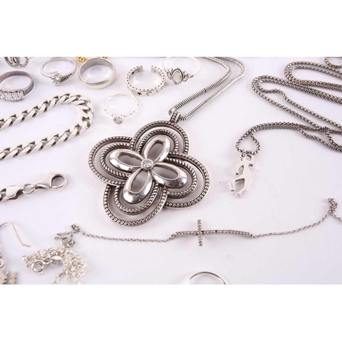 13 - A lot consisting of assorted white metal jewellery, to include a silver open bangle, engraved with g... 