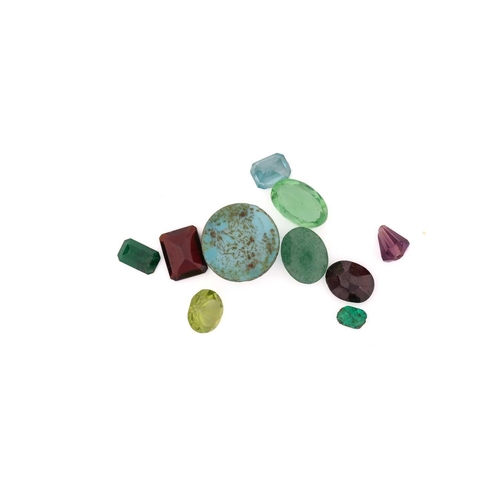 131 - A collection of gemstones and jewellery; to include two mounted citrine pendants, strings of culture... 