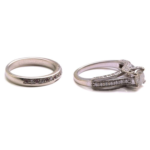 137 - A diamond trellis engagement ring and a fitted enhancer guard; The engagement ring forms from one ce... 