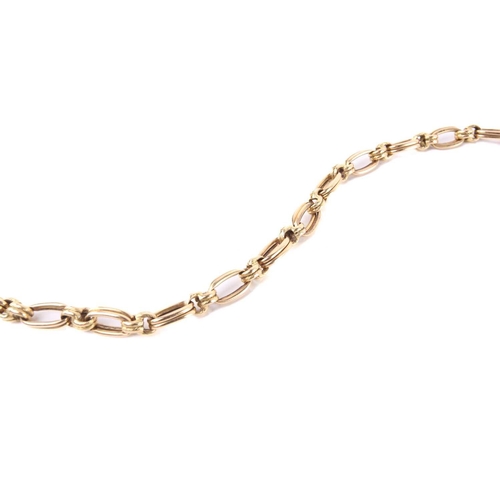 141 - A fancy cable link bracelet, with double links connected to textured intervals, fastened by a fold-o... 