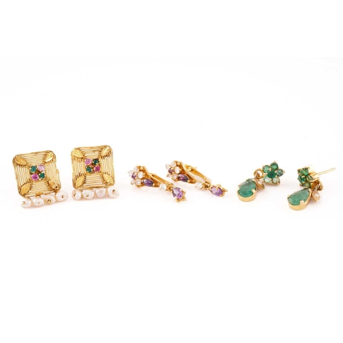 142 - Three pairs of gem-set earrings in high carat; to include a pair of earrings set with white and purp... 