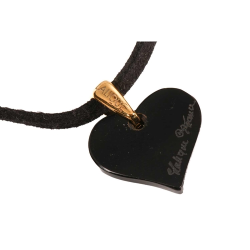 149 - Lalique - a black 'Amoureuse Beaucoup' heart pendant, with a yellow coloured gilt metal bale on an u... 