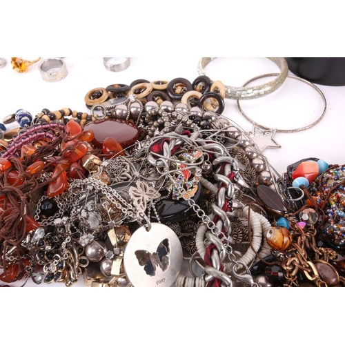 160 - Collection of assorted jewellery including necklaces, bangles, earrings and beaded chains etc.