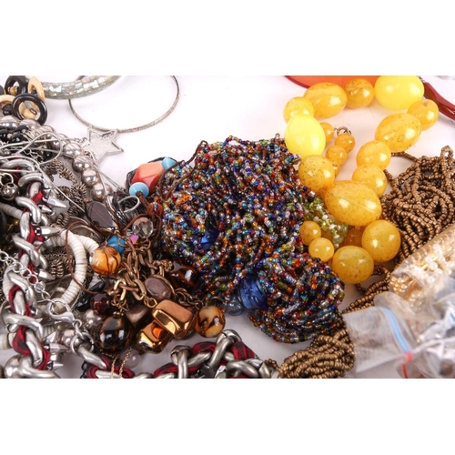 160 - Collection of assorted jewellery including necklaces, bangles, earrings and beaded chains etc.