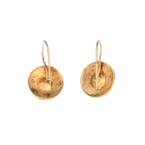 168 - A pair of pearl set disk earrings, formed from yellow metal (test as 18ct) engraved disks with a hal... 