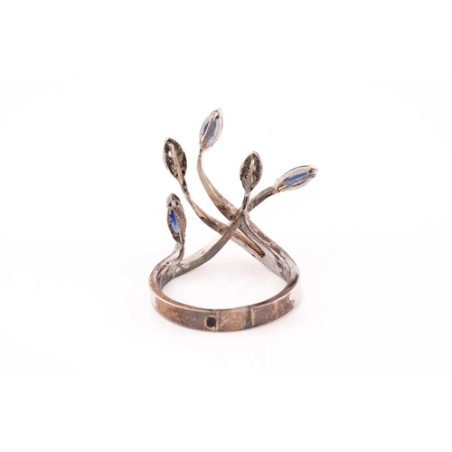 173 - A sapphire and diamond spray ring; the crossover mount with five strands, three terminating in marqu... 