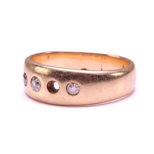 18 - An 18ct gold ring set with diamonds, comprising a plain band and later-added gemstones, graduated si... 