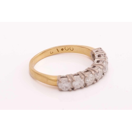 19 - A diamond half eternity ring, comprising seven brilliant-cut diamonds, approximately measuring 3.3 x... 