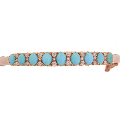 199 - A turquoise and diamond hinged bangle in yellow gold, featuring a graduated row of nine turquoise ca... 