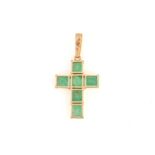 202 - A cross pendant set with emeralds, comprising six square emerald-cut emeralds claw-set in cruciform ... 