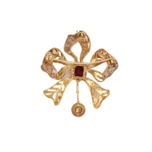 206 - A ruby and diamond bow pendant brooch, comprising a rectangular emerald-cut ruby in collet approxima... 