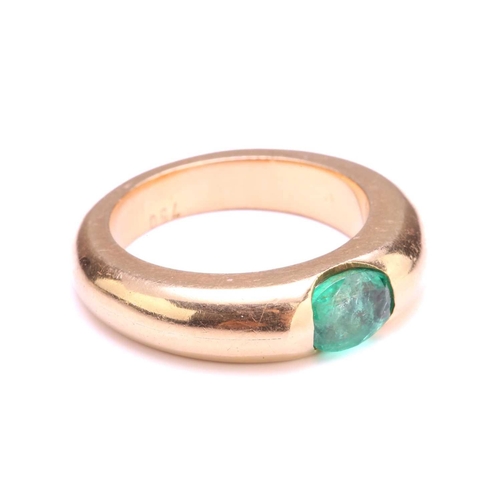 214 - A gypsy ring set with oval emerald, containing an oval-cut emerald of 6.2 x 4.8 mm, tension set to a... 