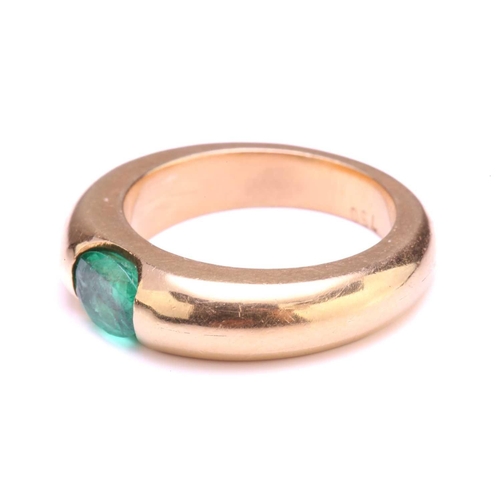 214 - A gypsy ring set with oval emerald, containing an oval-cut emerald of 6.2 x 4.8 mm, tension set to a... 