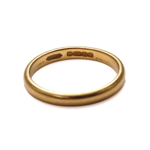 22 - WaterAid UK Charity lot - A 22ct yellow gold wedding band, consisting of a plain D-profile shank, Bi... 