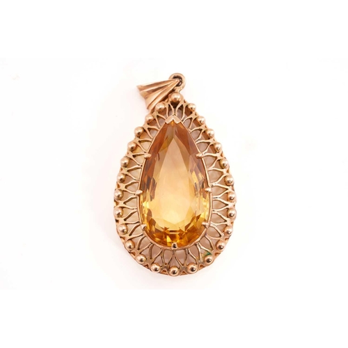 227 - A citrine demi-parure, including a pair of drop earrings, a ring and a pendant; The pair of earrings... 