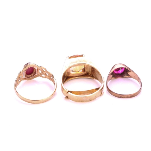 258 - Two gem-set rings in 9ct yellow gold and another; to include a round citrine set ring, hallmarked '3... 