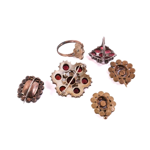 263 - A garnet cluster brooch and ring, and other paste jewellery; the brooch comprises seven larger rose-... 