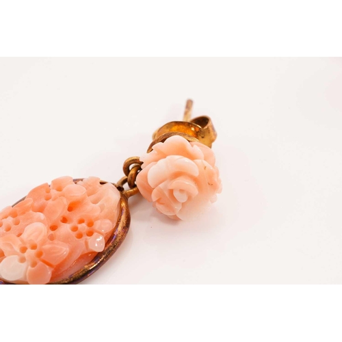 271 - Two pairs of coral earrings, including a pair of floral drop earrings, each consists of an oval carv... 