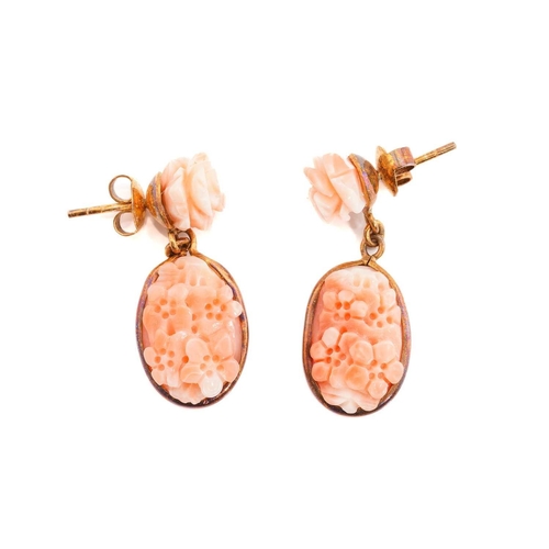 271 - Two pairs of coral earrings, including a pair of floral drop earrings, each consists of an oval carv... 