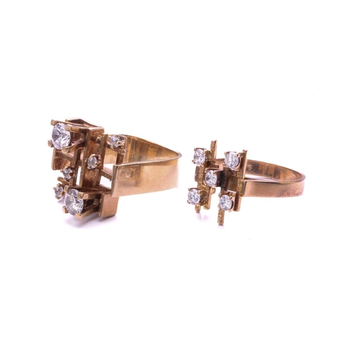 279 - A Modernist ring, set with six cubic zirconia in an angled framework, to an angled shank; together w... 