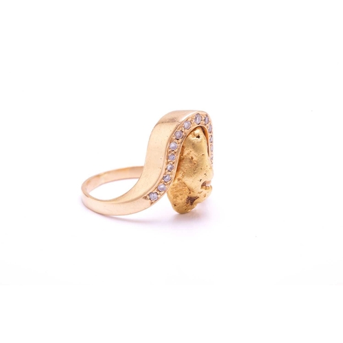 283 - A nugget ring embellished with diamonds, featuring a yellow metal nugget (tests as high carat gold) ... 