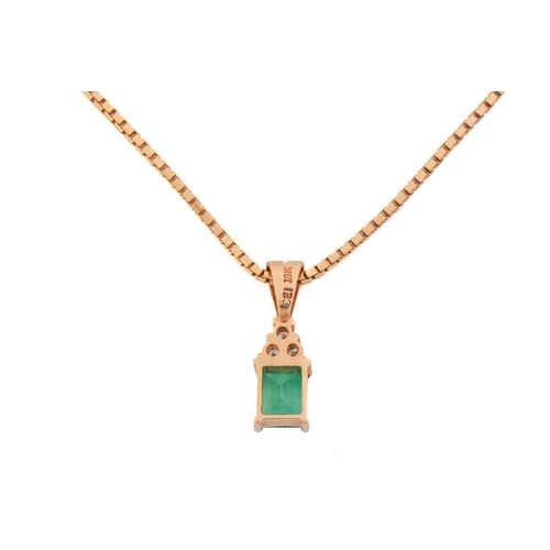 287 - An emerald pendant and matching earrings; the pendant comprises an emerald-cut emerald with vivid gr... 