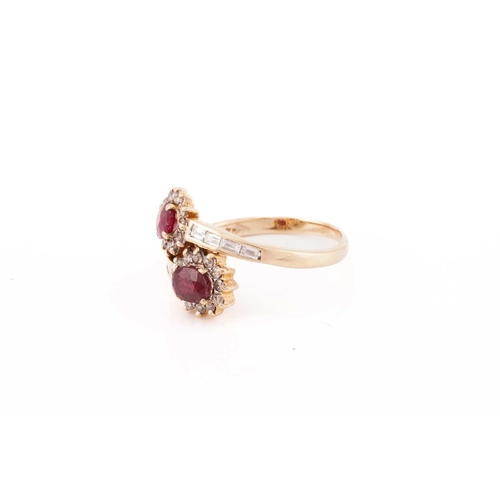 308 - A ruby and diamond bypass ring, composed of two clusters of oval faceted rubies surrounded by brilli... 