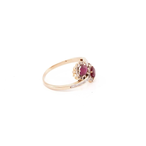 308 - A ruby and diamond bypass ring, composed of two clusters of oval faceted rubies surrounded by brilli... 