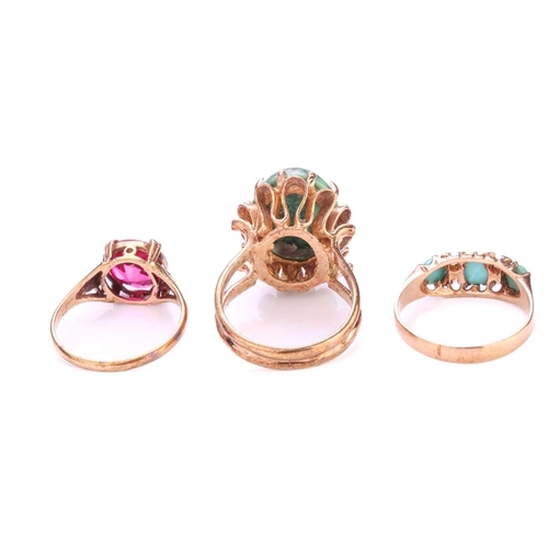 313 - Three gem-set rings in 9ct gold; to include a three-stone turquoise half hoop ring, flanked by seed ... 