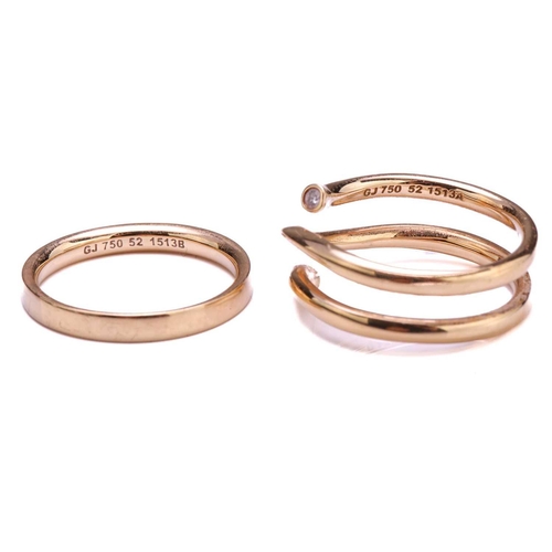 327 - Georg Jensen - Two 18ct yellow gold and diamond rings from the 'MAGIC' collection; the first compris... 