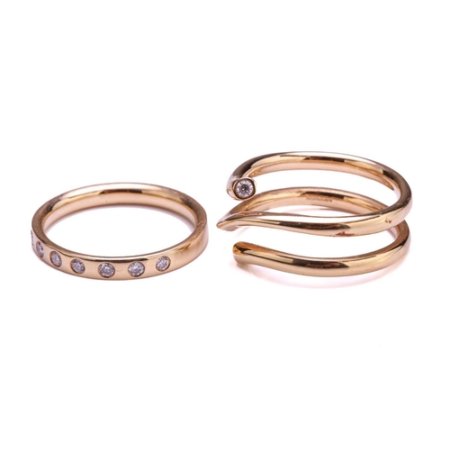 327 - Georg Jensen - Two 18ct yellow gold and diamond rings from the 'MAGIC' collection; the first compris... 