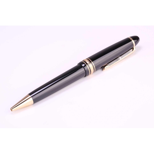 349 - A Montblanc Meisterstück Classique rollerball pen, with twist action in black resin, gold-tone hardw... 