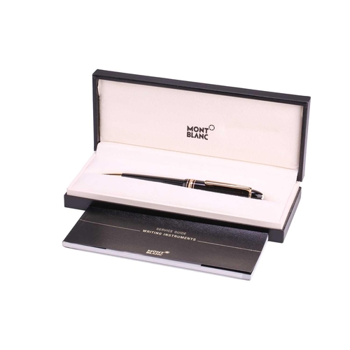 349 - A Montblanc Meisterstück Classique rollerball pen, with twist action in black resin, gold-tone hardw... 