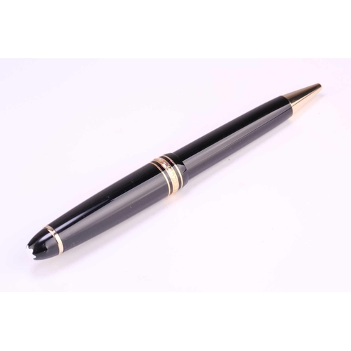 349 - A Montblanc Meisterstück Classique rollerball pen, with twist action in black resin, gold-tone hardw... 